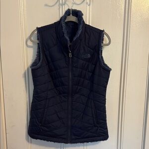 The North Face Blue Quilted Vest with Stand-Up Collar